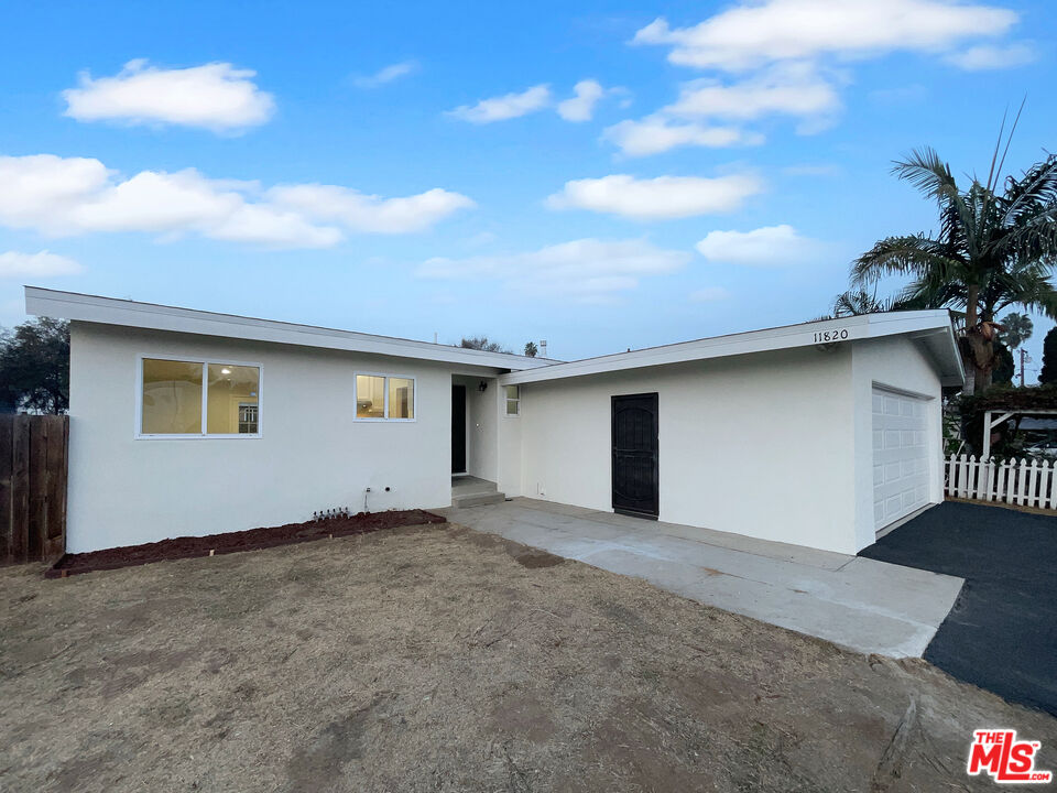 a view of a house with a garage