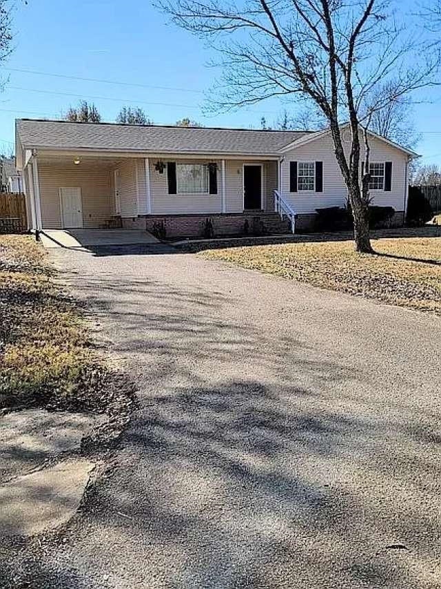 a front view of house with yard