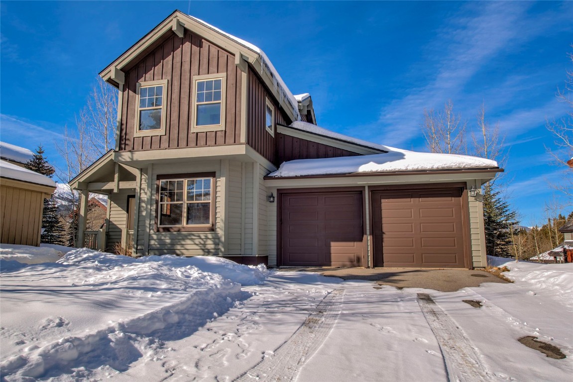 View of property featuring a garage