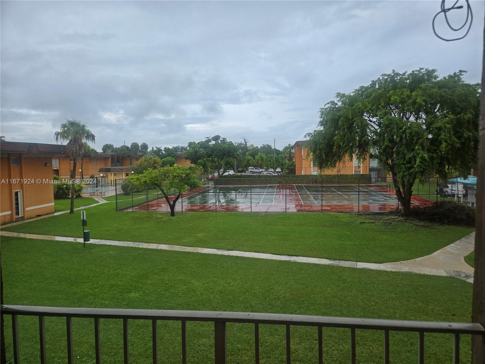 a view of a golf course with a lake