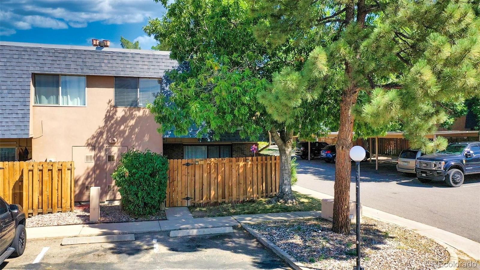 a front view of a house with parking area