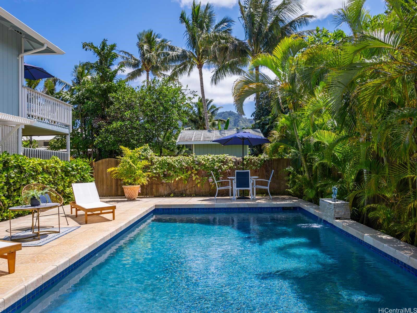 a view of a backyard with a patio