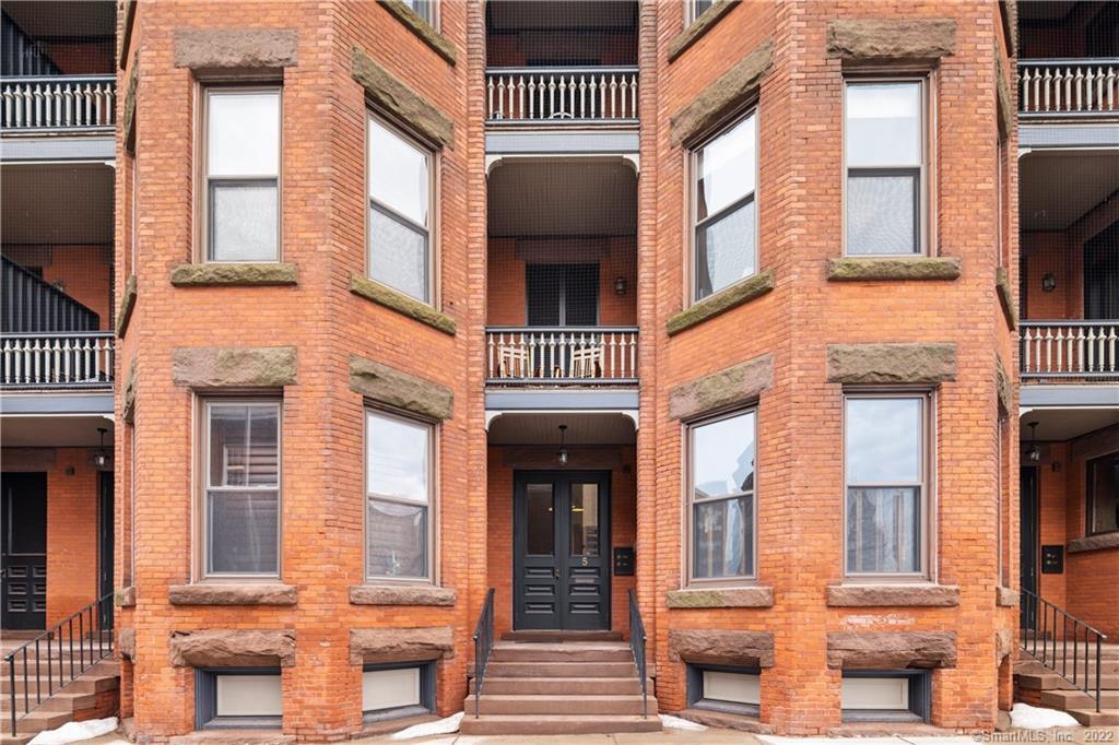 a front view of a multi story residential apartment building