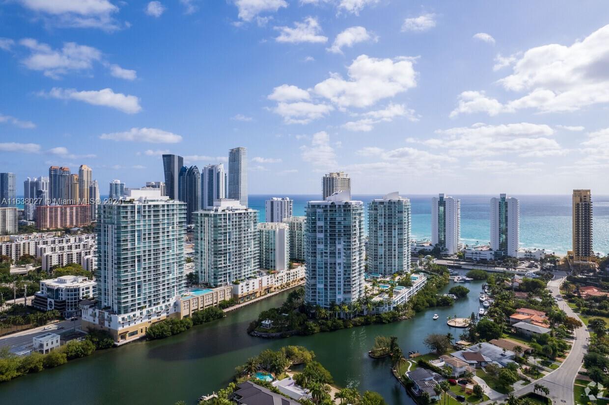 a view of a city with tall buildings