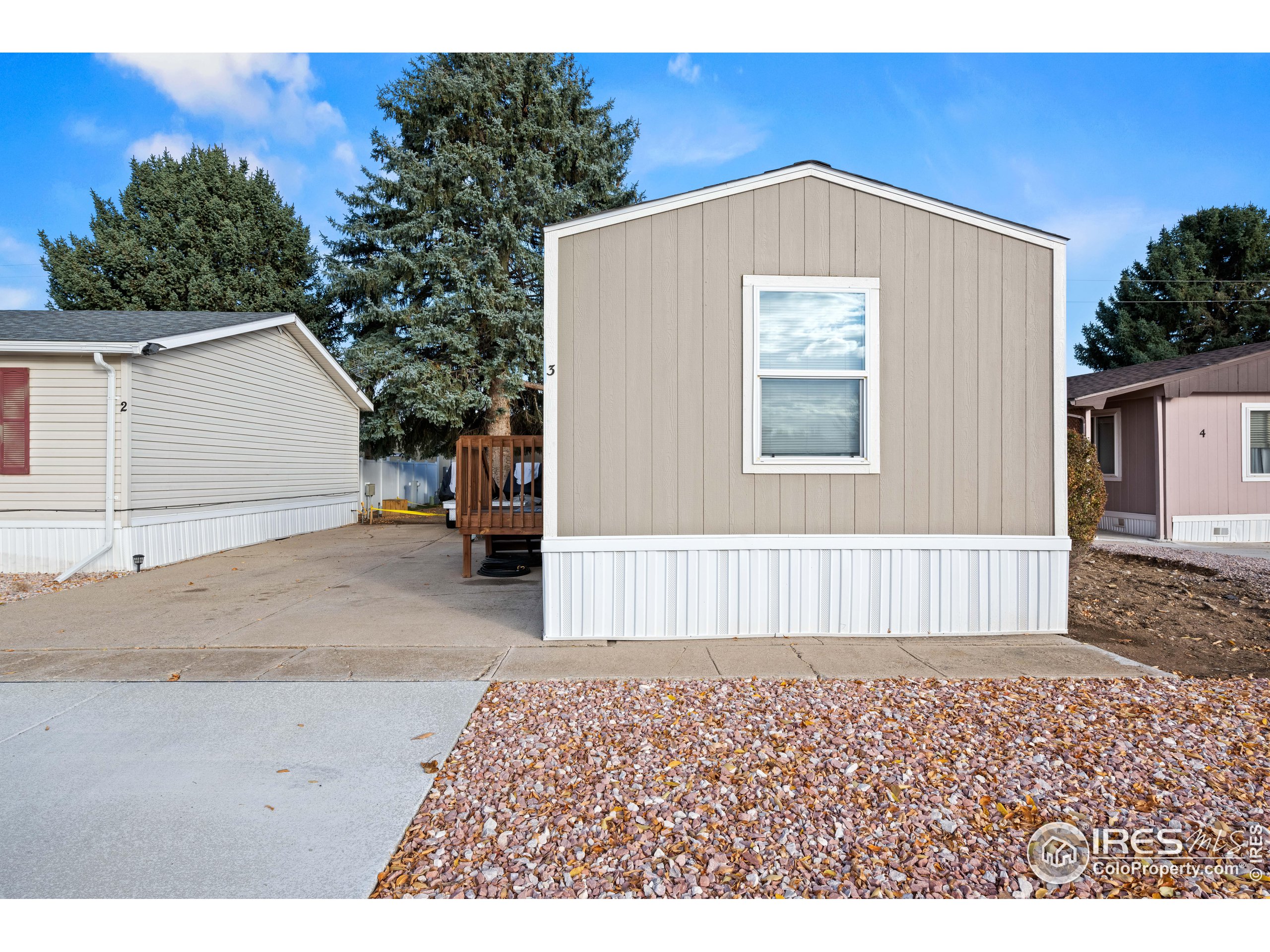 a front view of a house with a garage