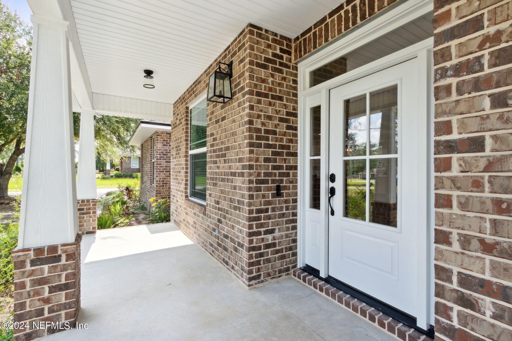 a view of front door of house with a porch