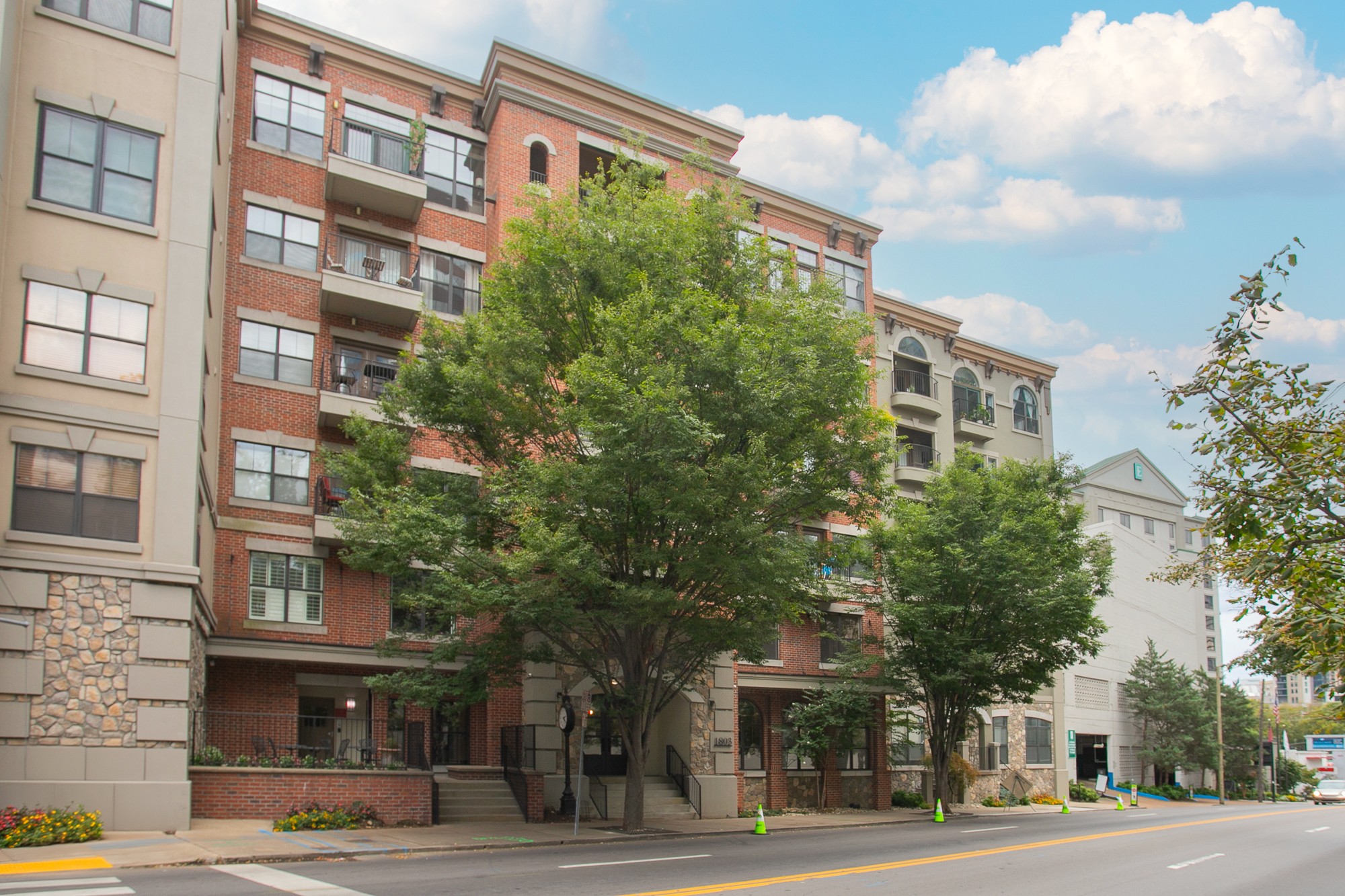 a view of a building and a street