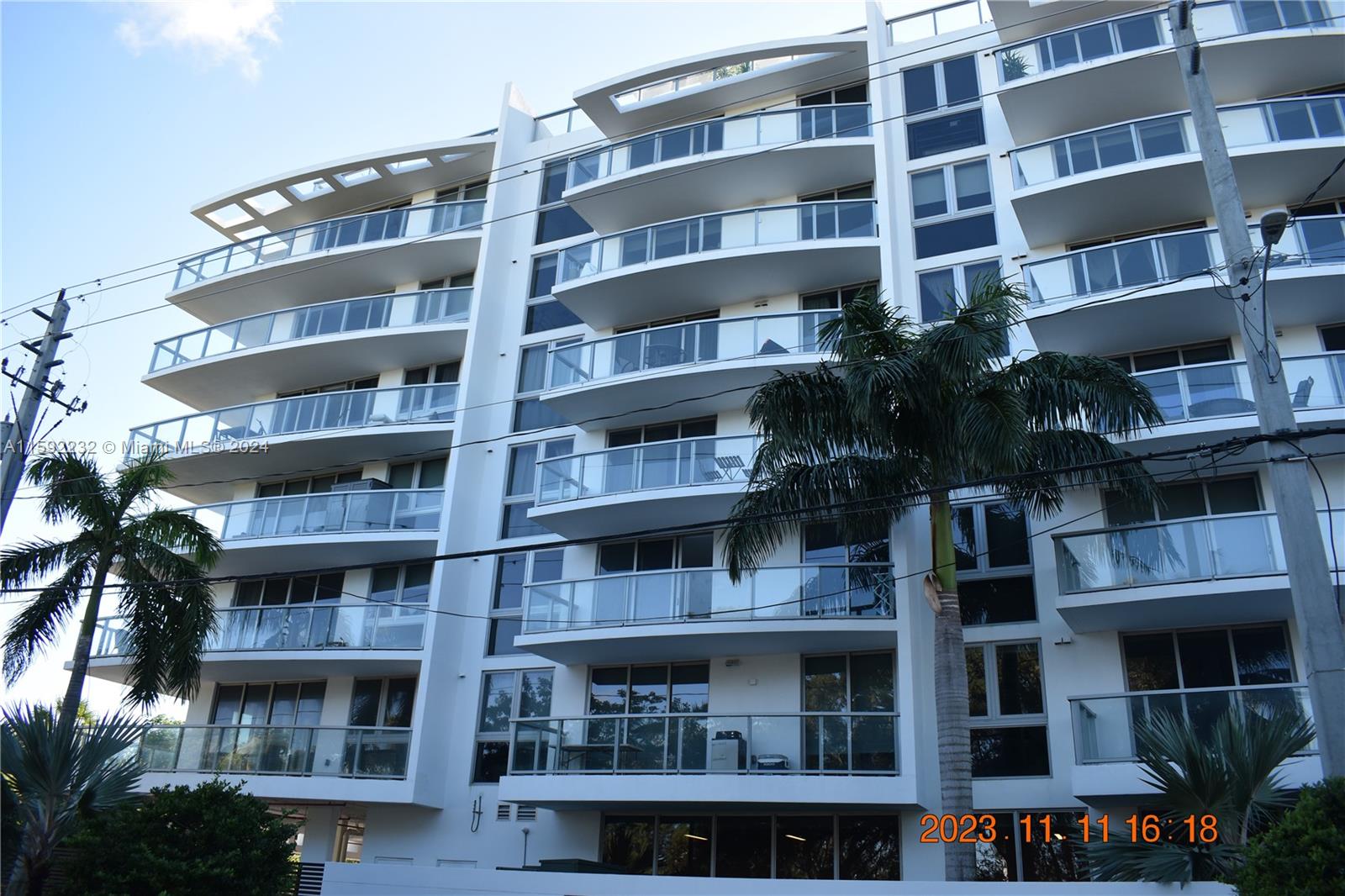 a front view of multi story residential apartment building