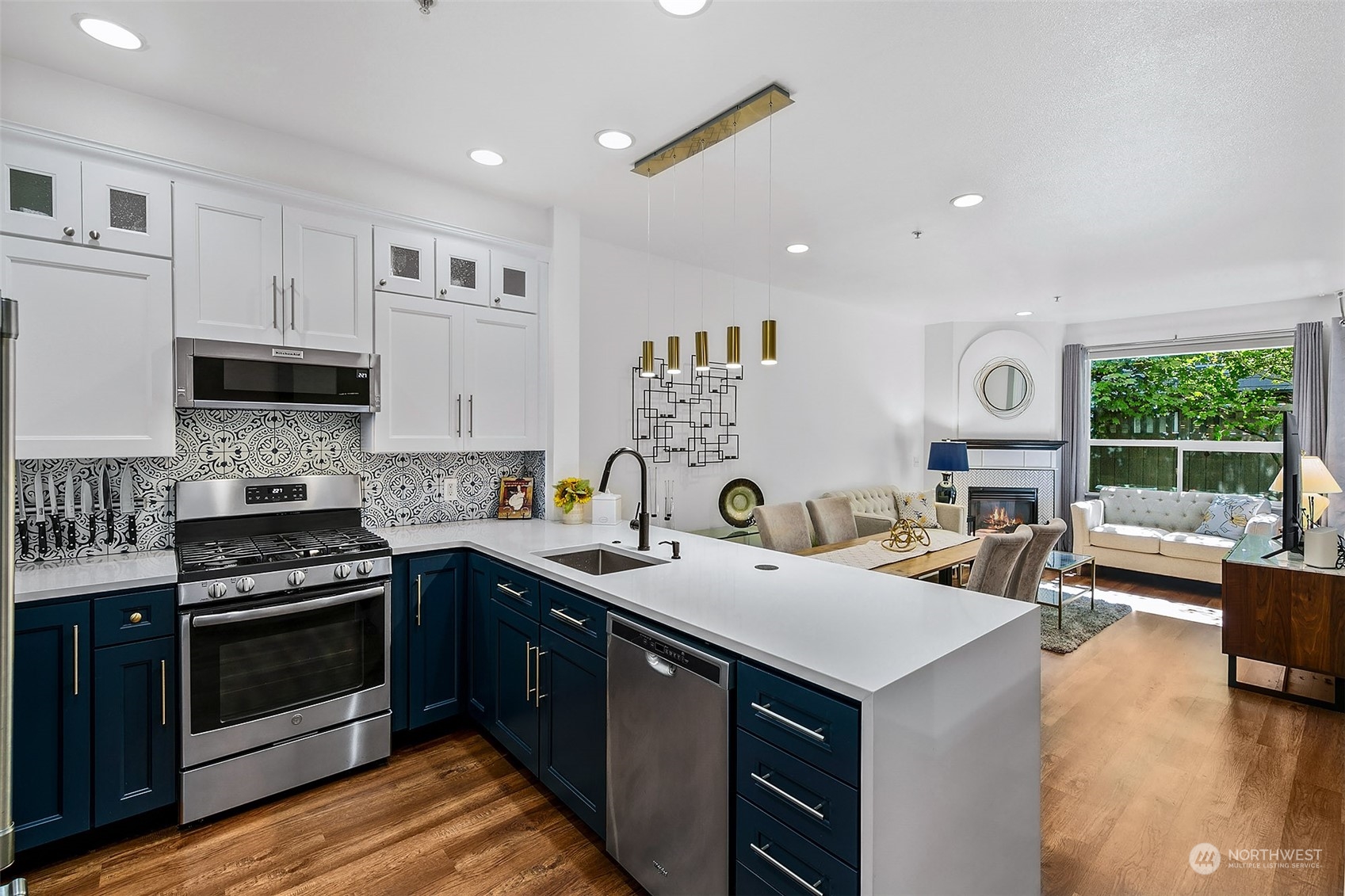 a kitchen with a stove and a sink