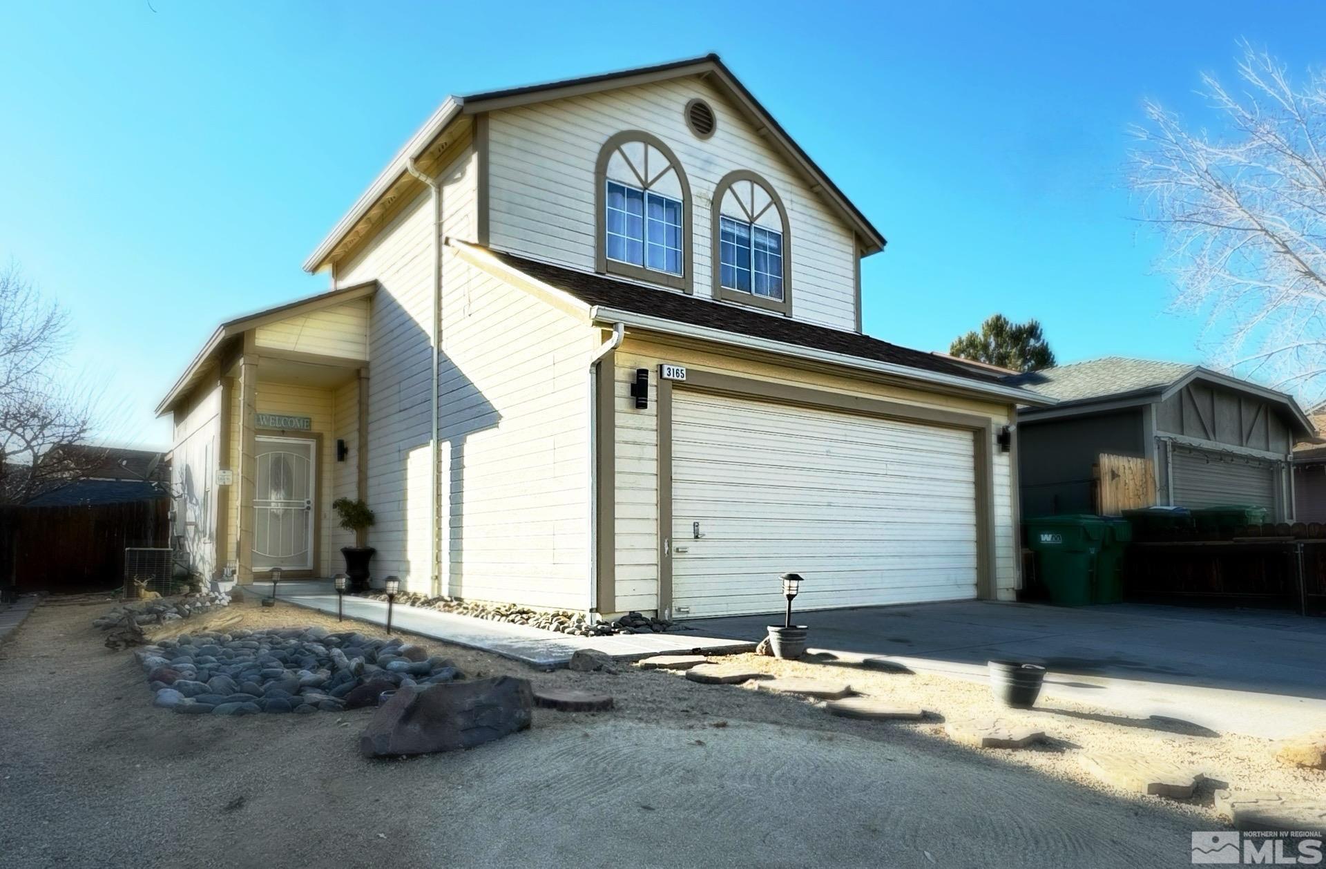 a view of a house with a patio