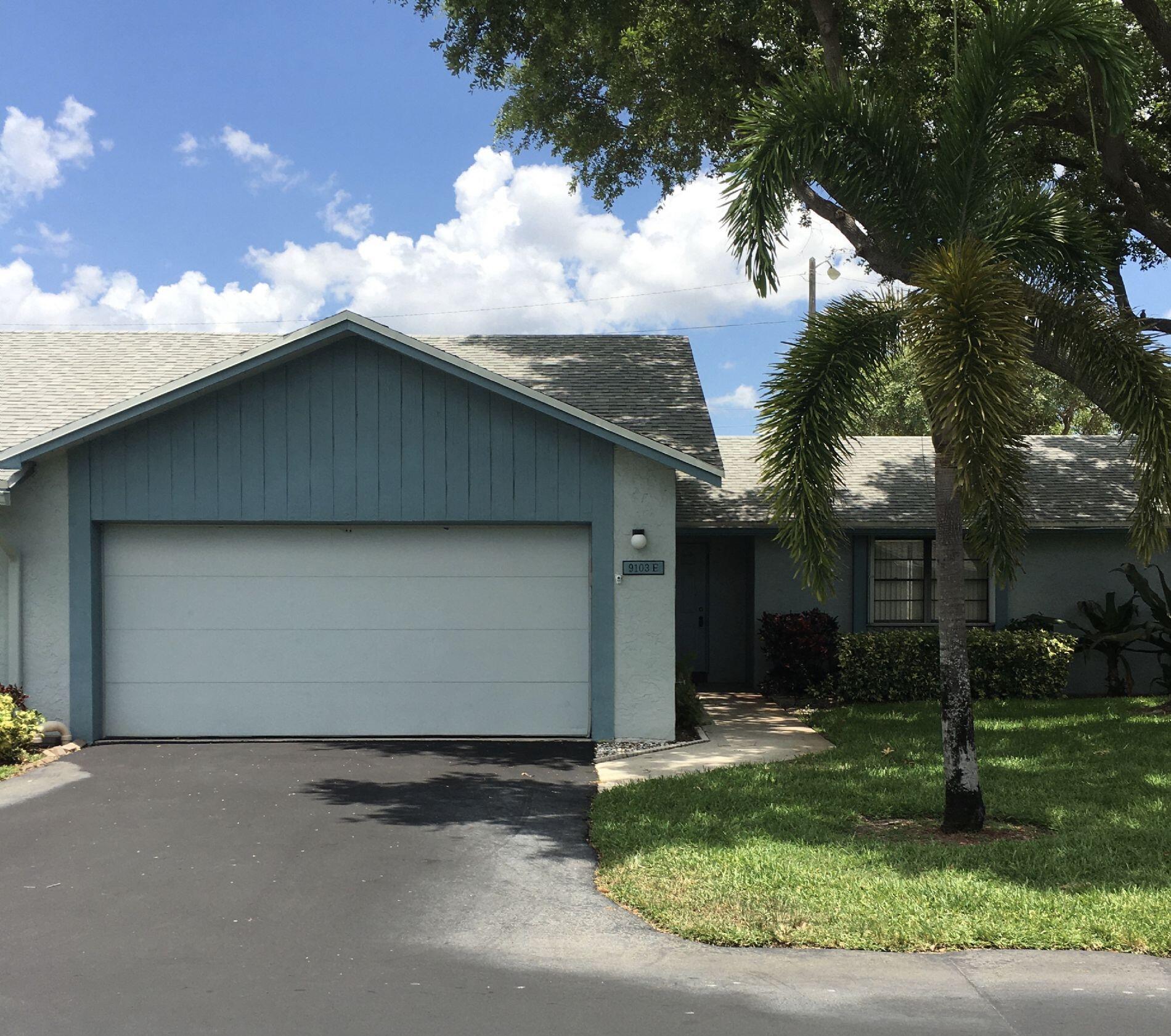 a front view of house with yard