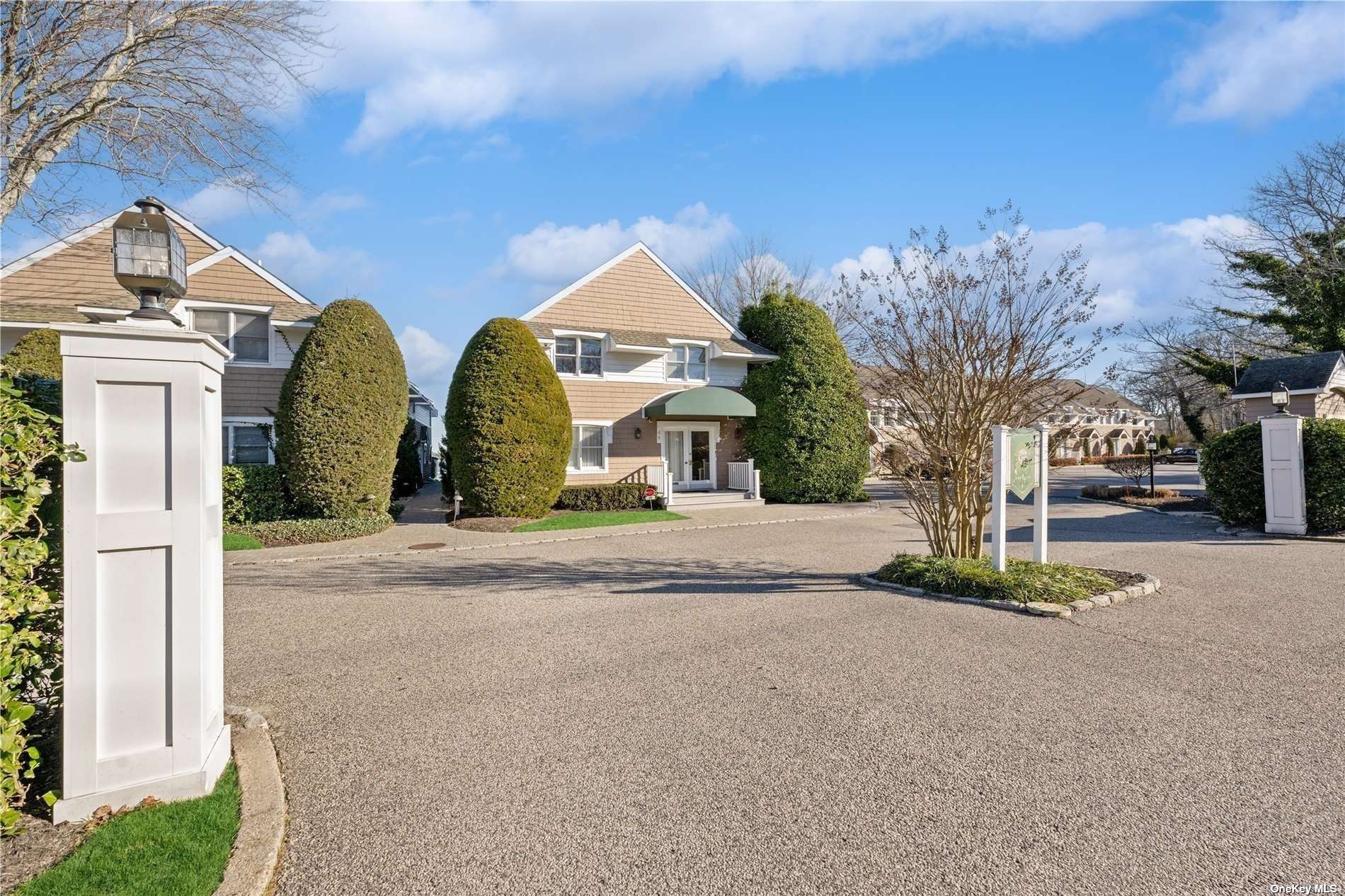 a view of multiple house with tree s