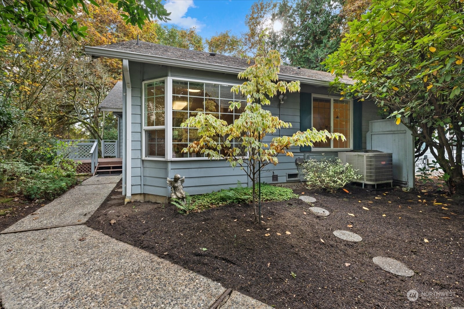 a front view of house with garden