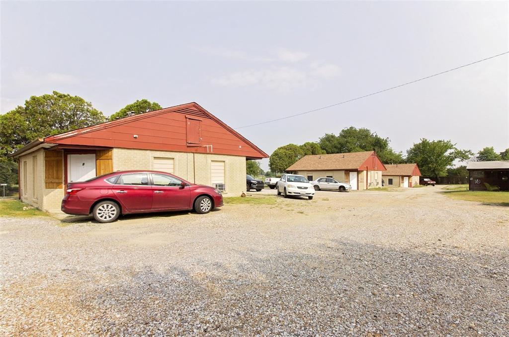 a view of a car parked in front of a house