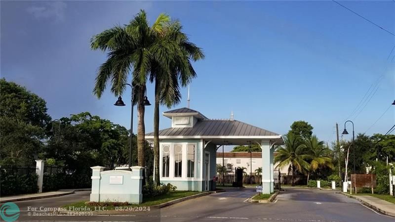 a front view of a house with tree s