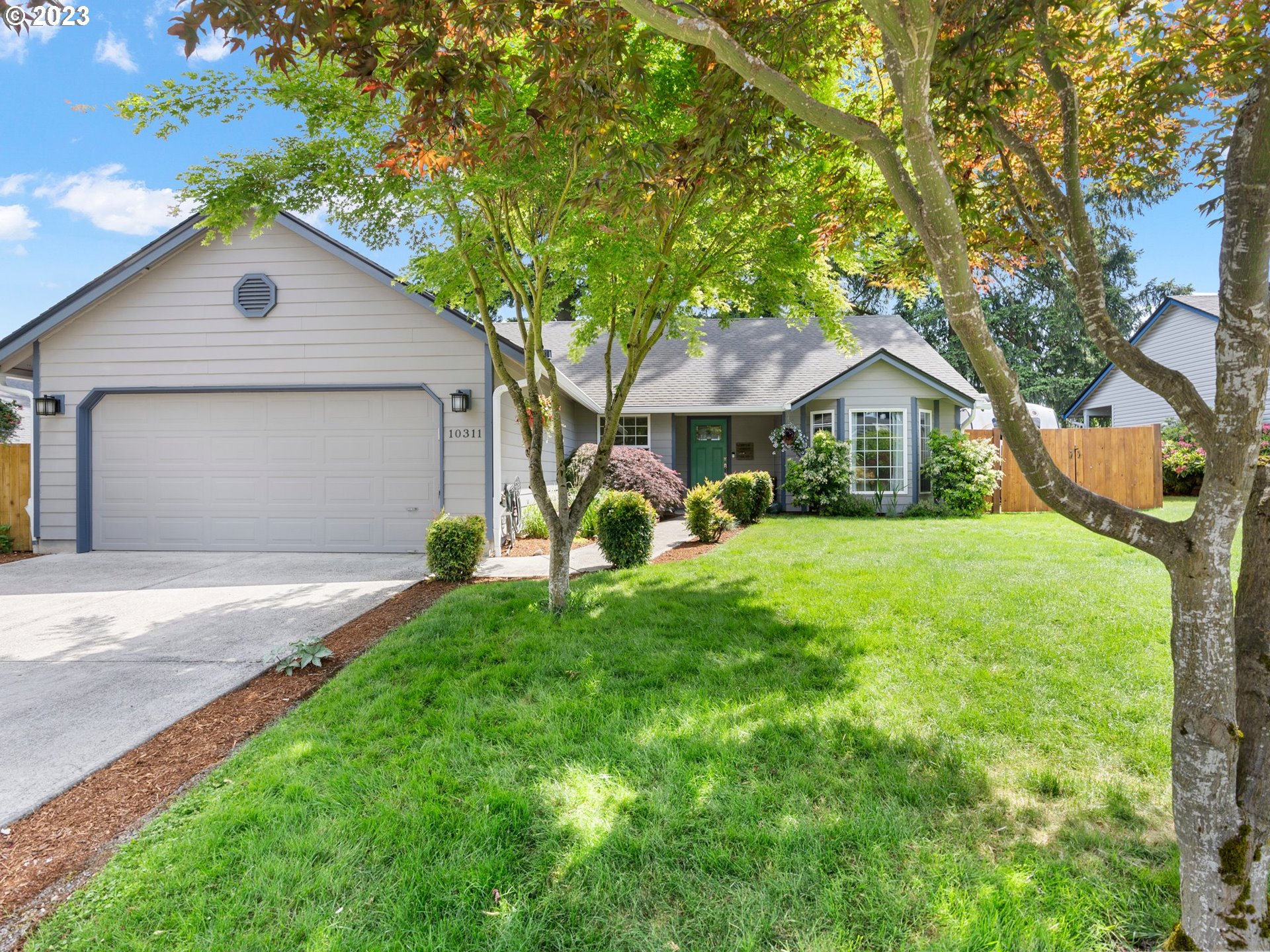 a house view with a garden space