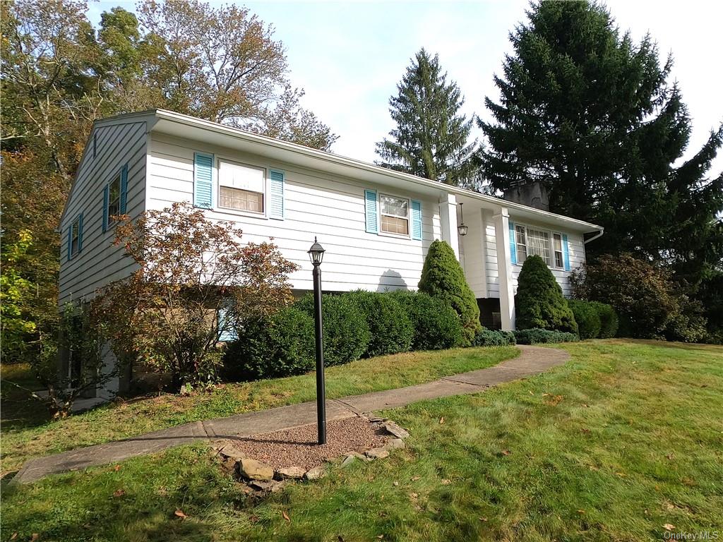 View of front of house with a front lawn