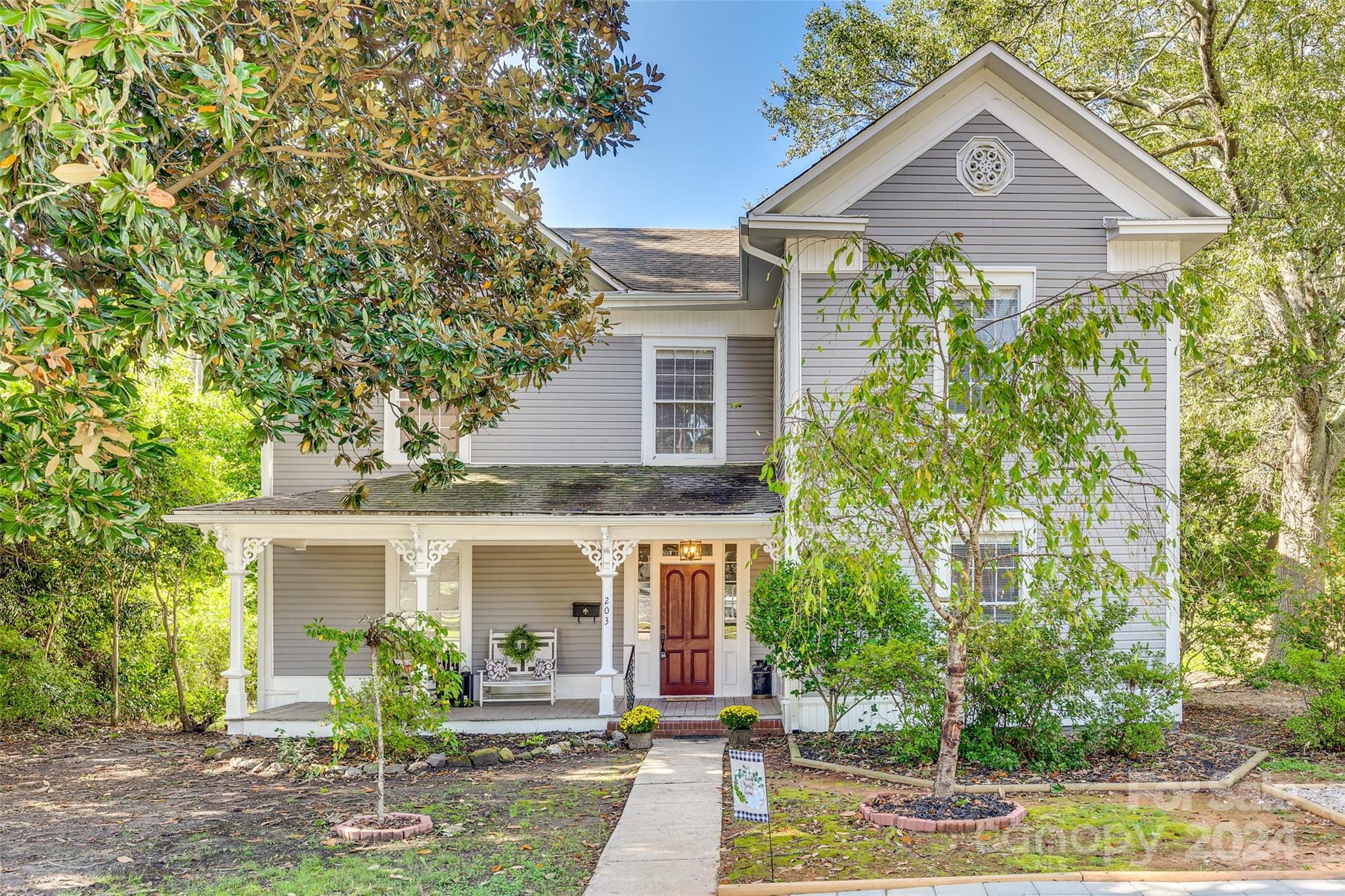 front view of a house with a yard