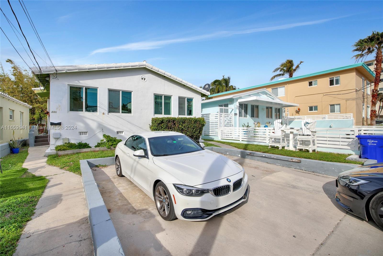 a front view of a house with swimming pool