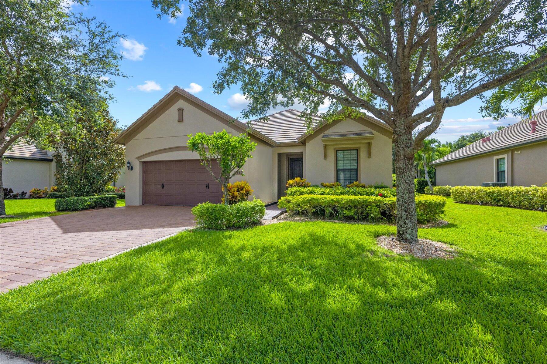 a house view with a garden space