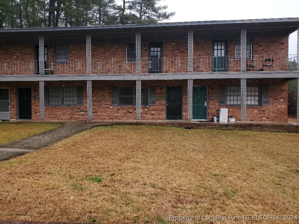 a view of house with outdoor space