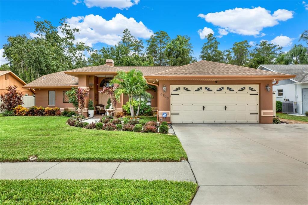 a view of a house with a yard