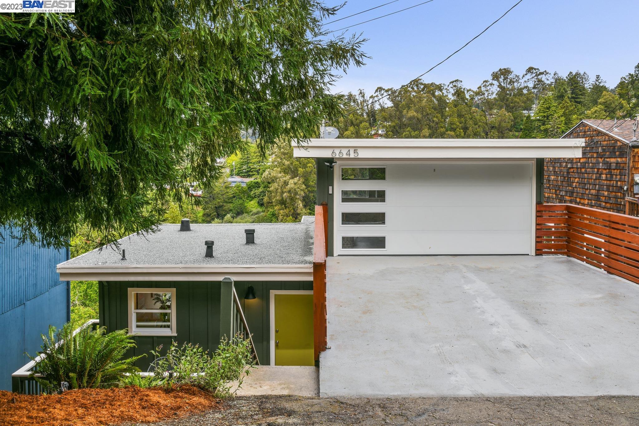 a house view with a garden space