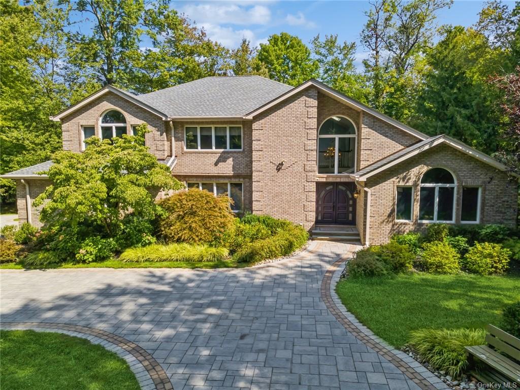 8 Chipman Rd. Brick colonial enjoying the morning sun.