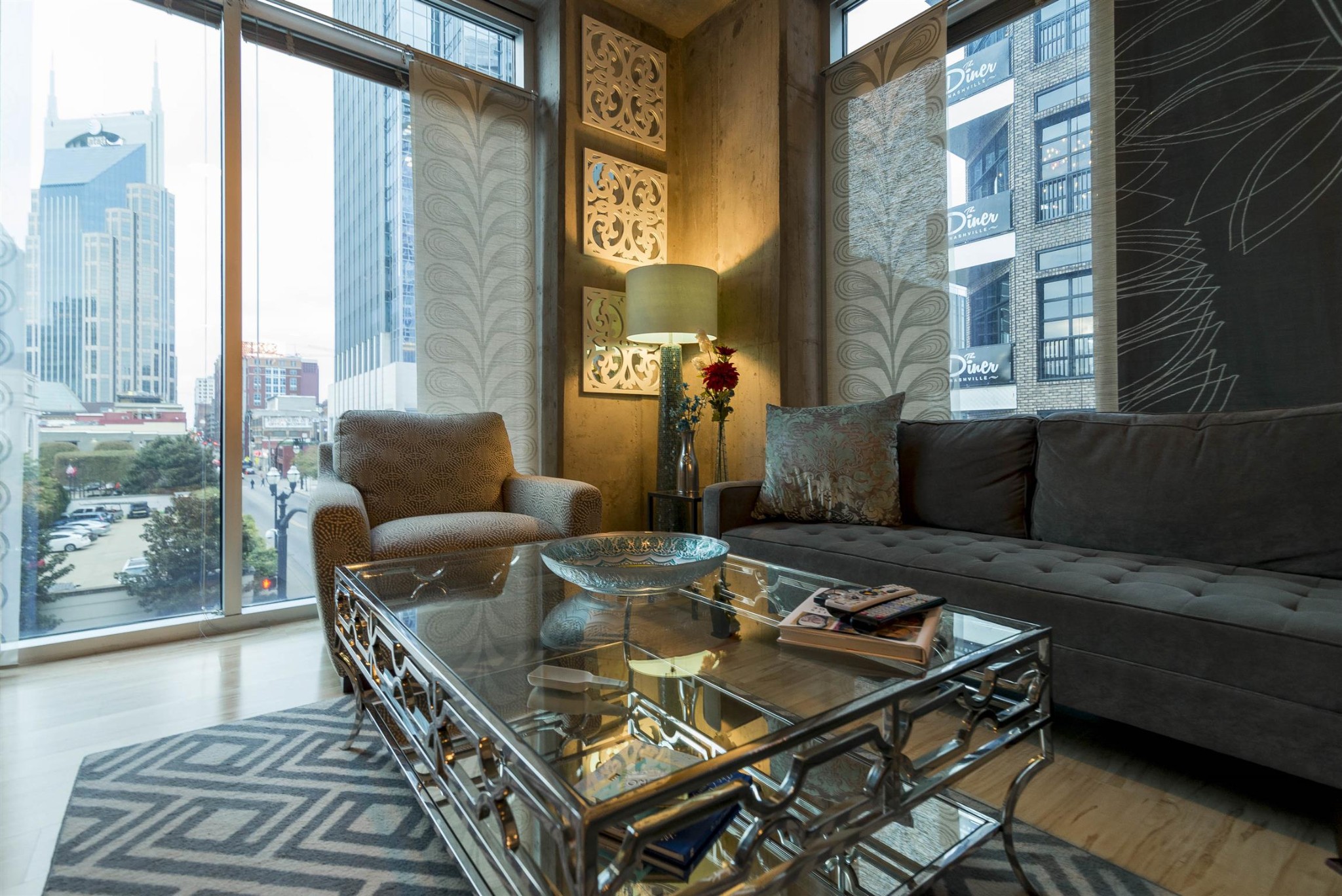 a living room with furniture and a table