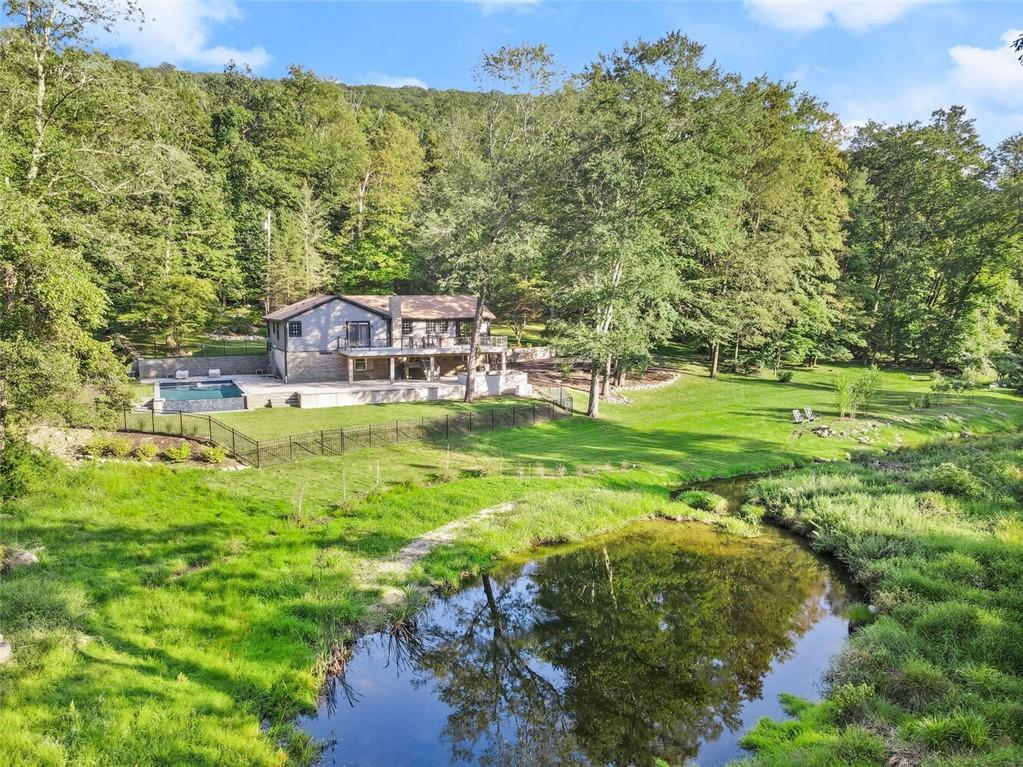 Welcome to 135 Bell Hollow Road.  Enjoy absolute privacy and tranquility just over 1 hour drive to New York City.