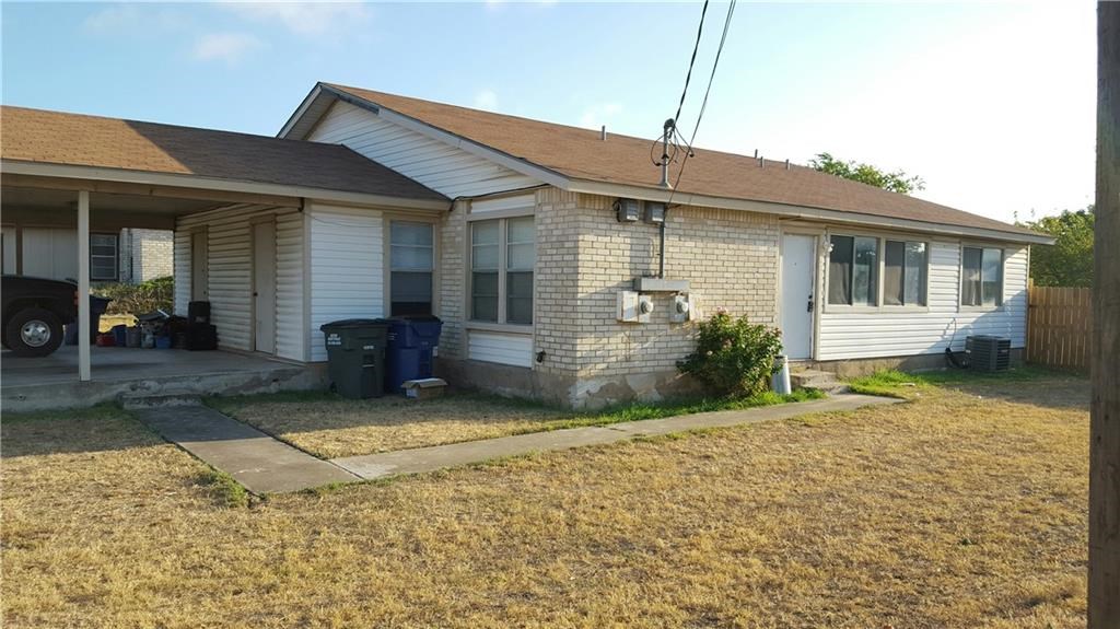 a view of a house with a patio