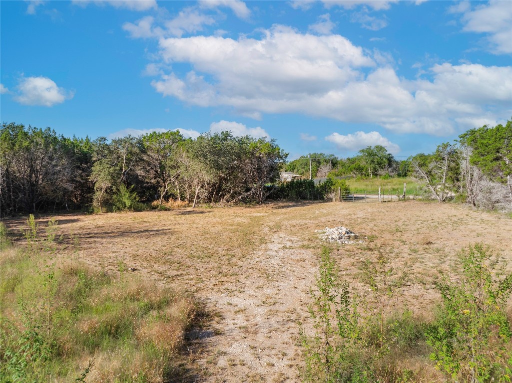 a view of a yard with a house