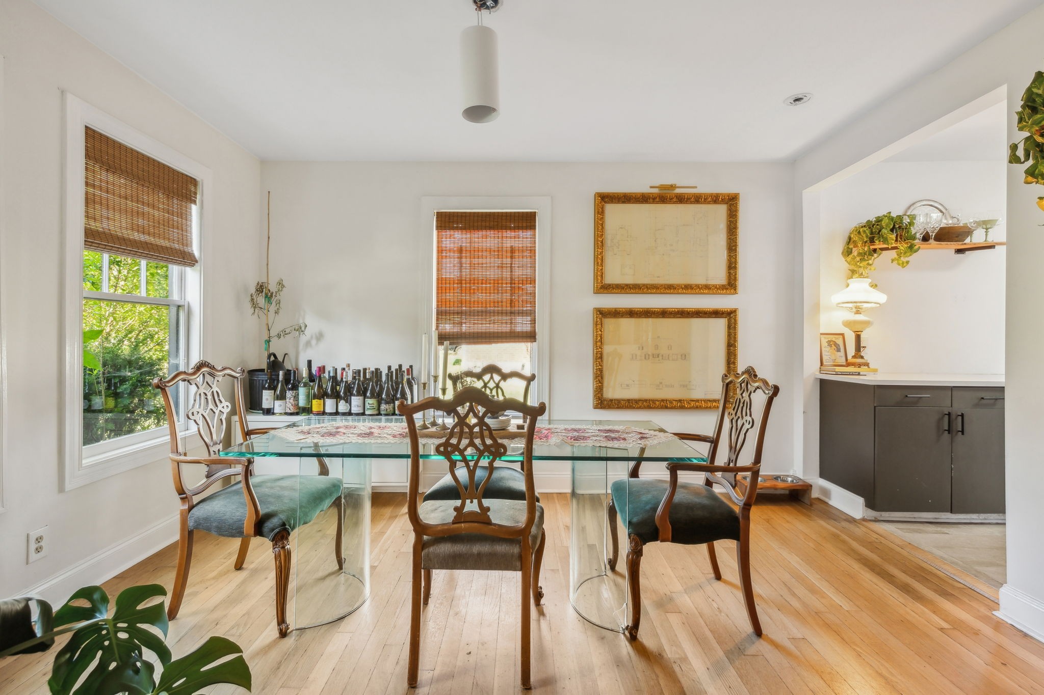 a view of a dining room with furniture window and outside view