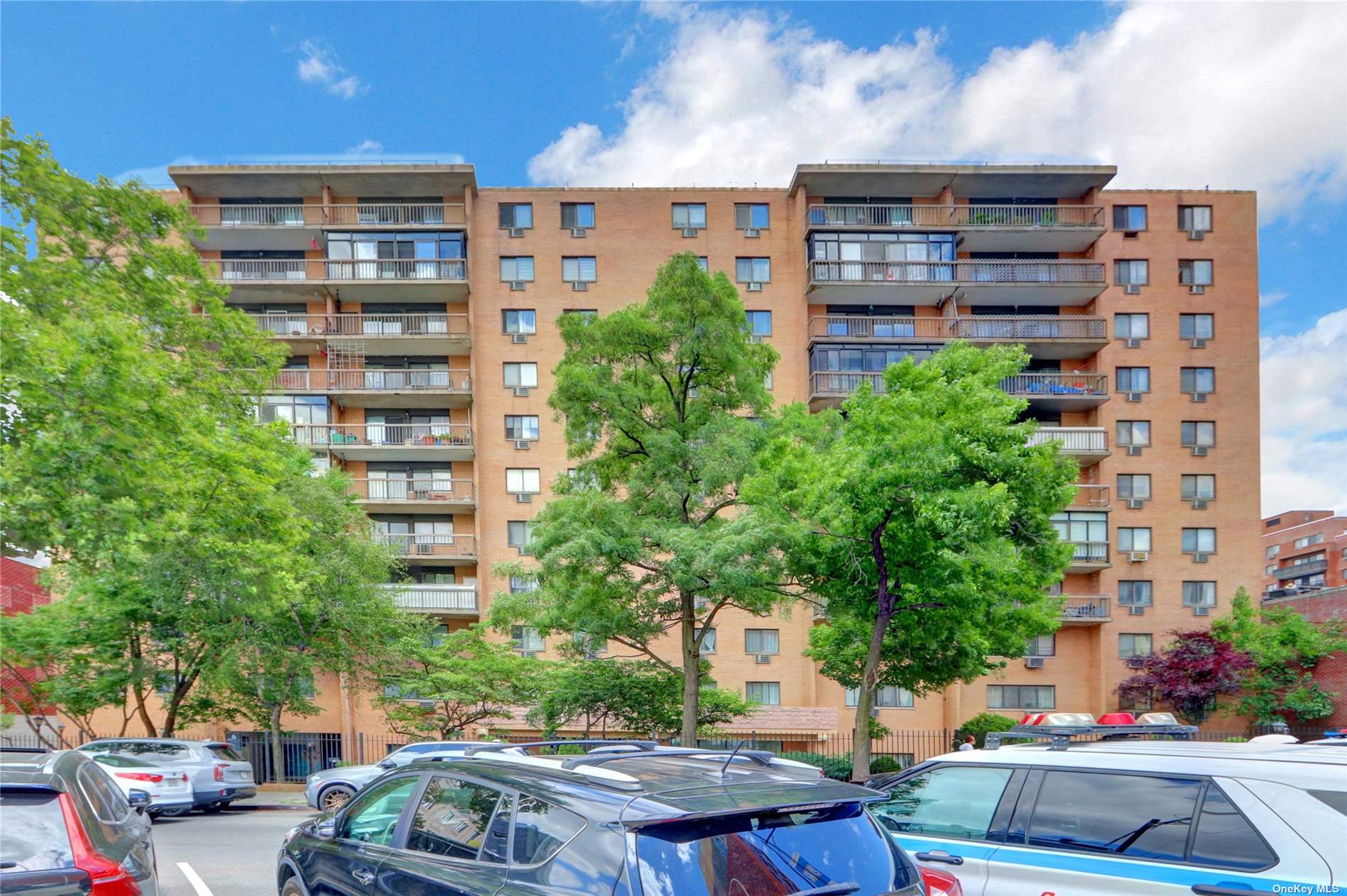 a front view of a building with street view