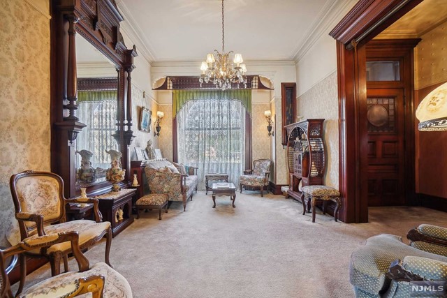 a view of a livingroom with furniture and windows