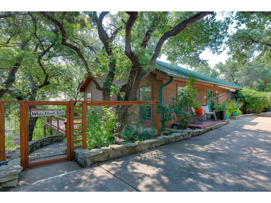 a view of a backyard with garden