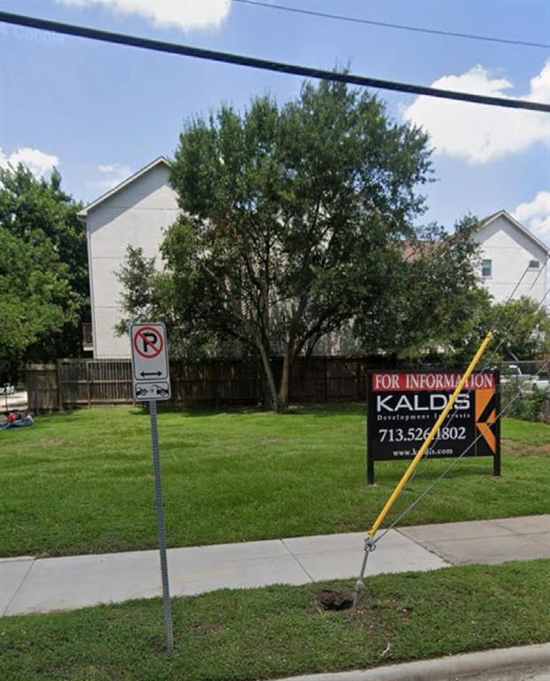 a sign that is on the side of the house