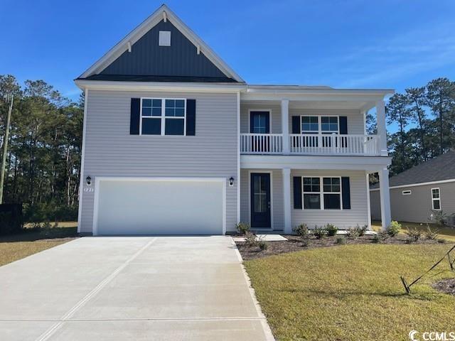 View of front of home featuring a garage, a front