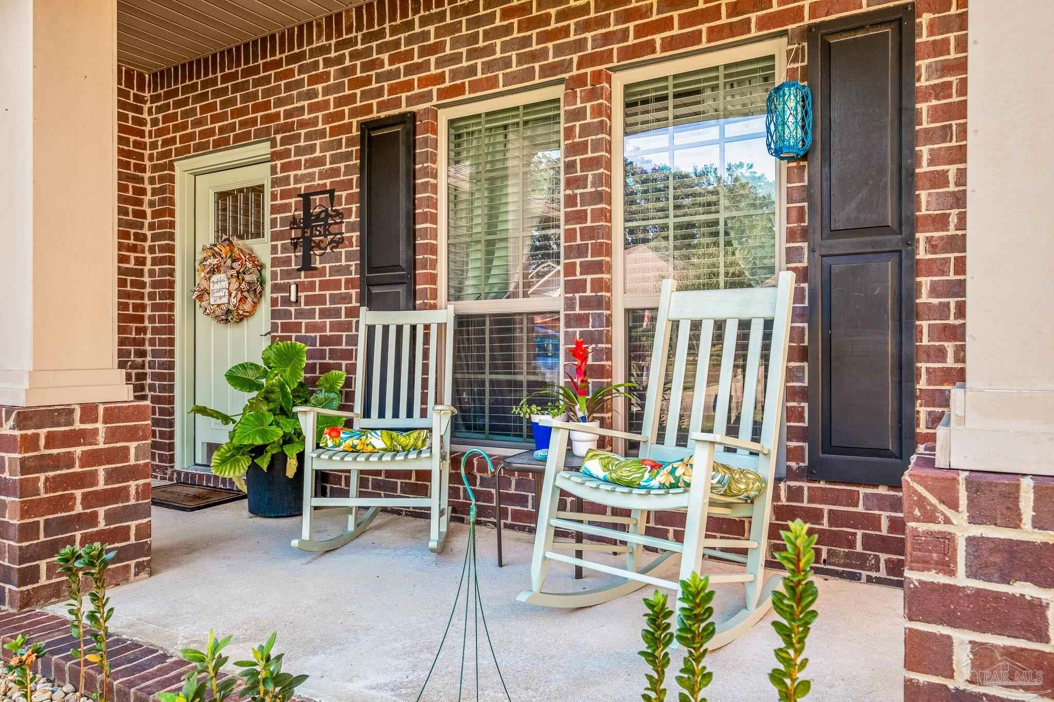 a view of a chairs with a porch