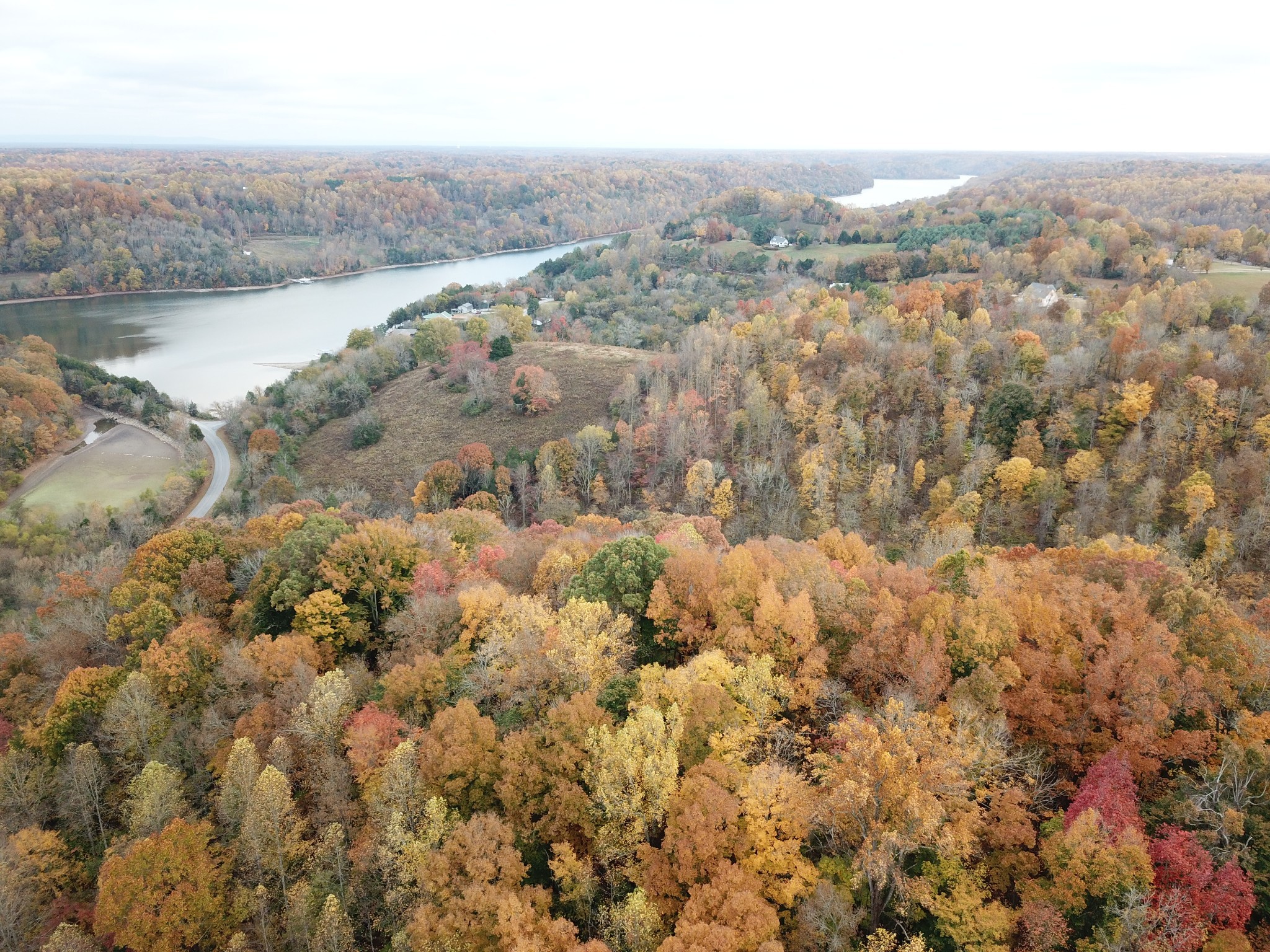 an aerial view of mountain with lake view