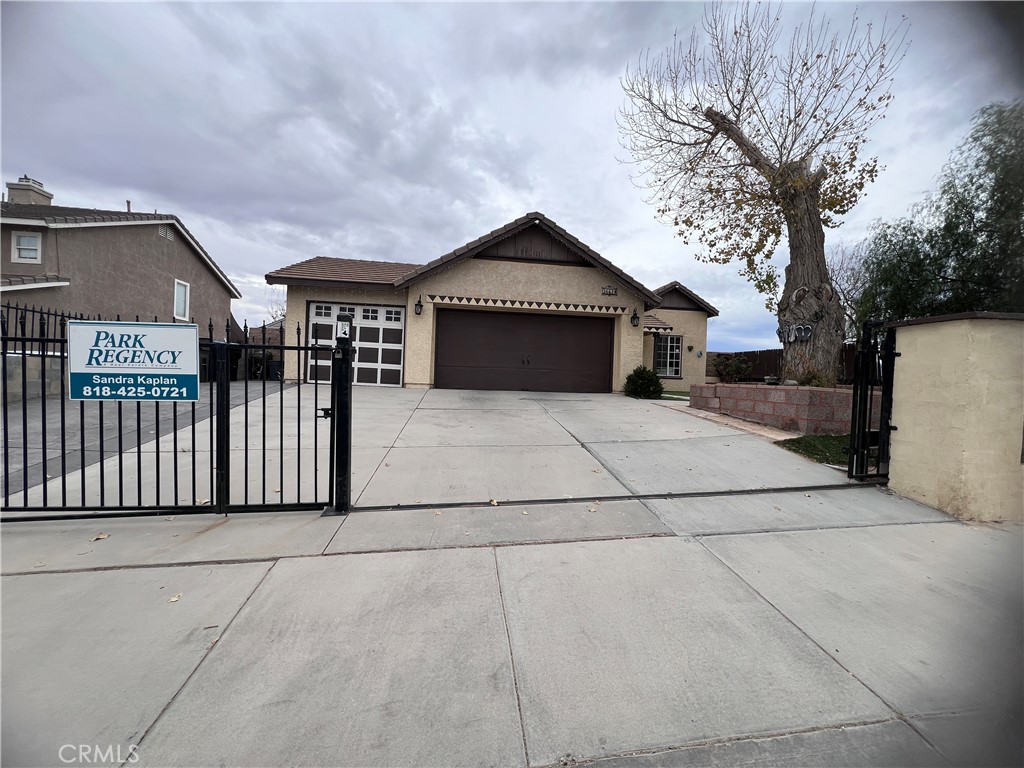 a house with white fence