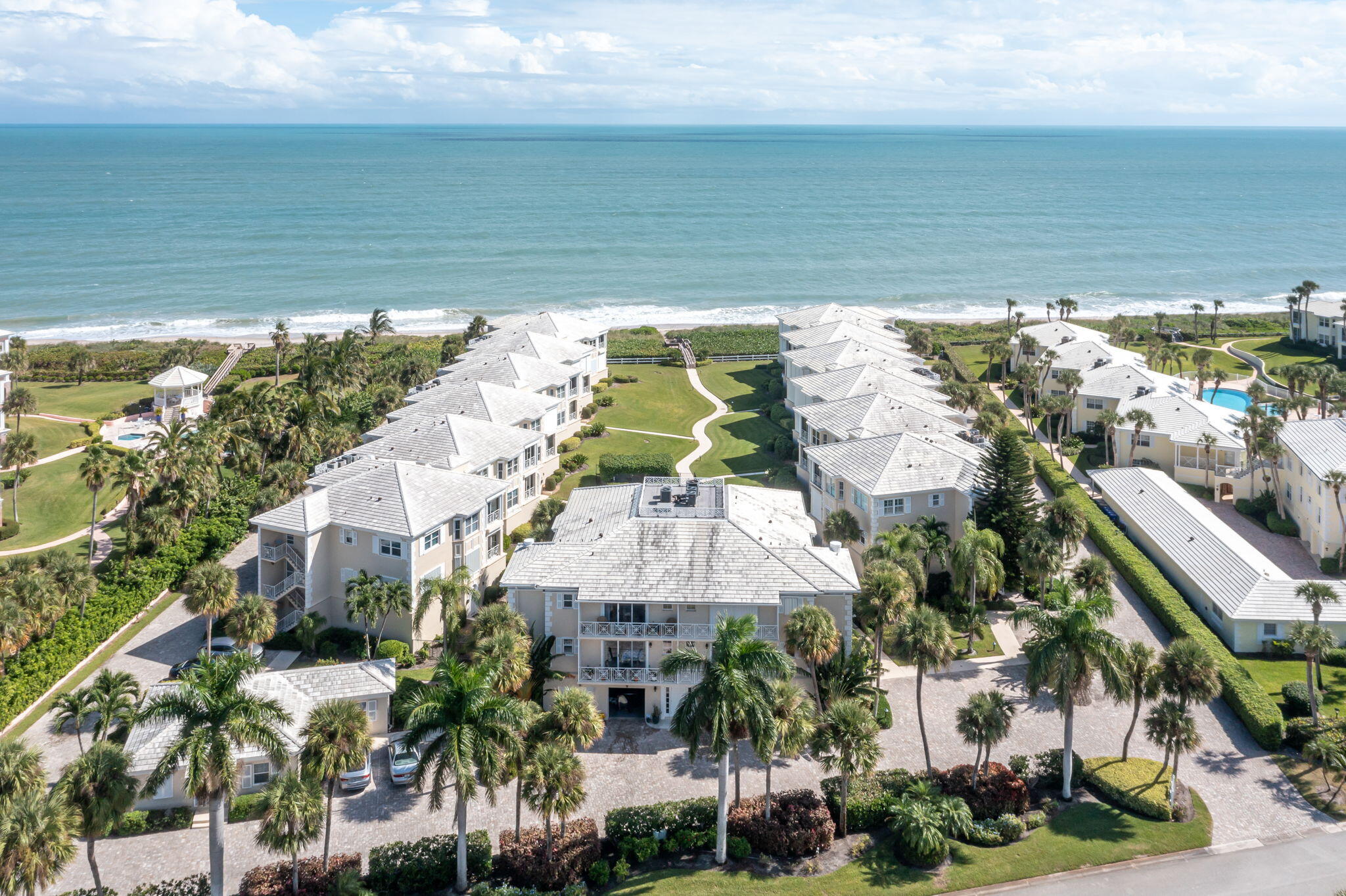 a aerial view of a house with a ocean view