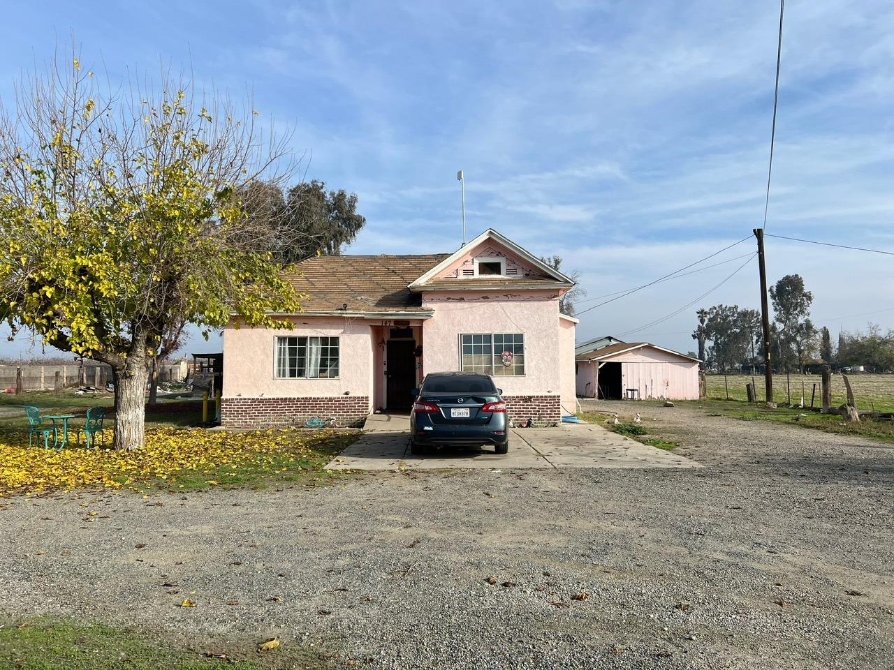 a car parked in front of a house