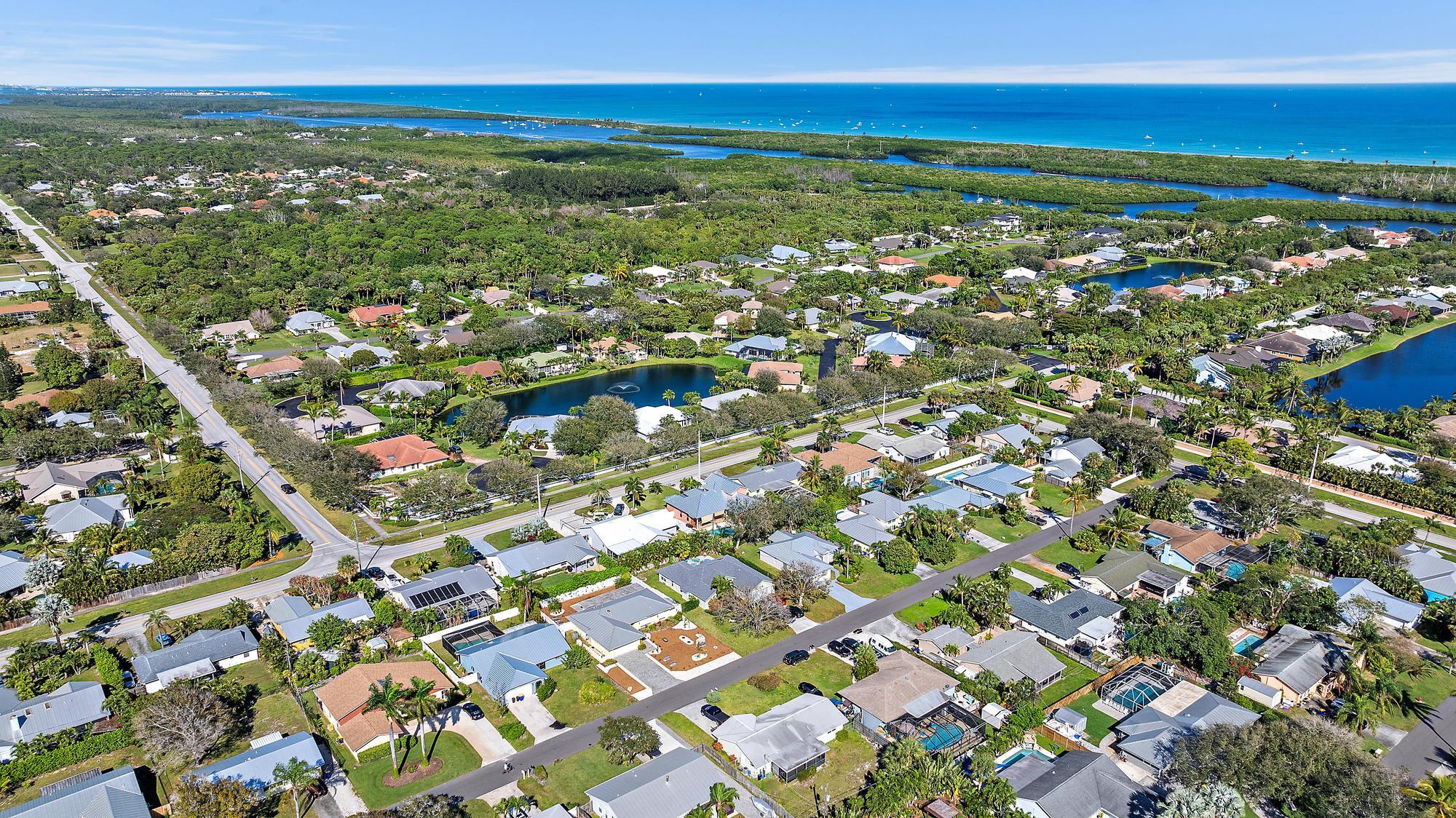 a view of city with ocean