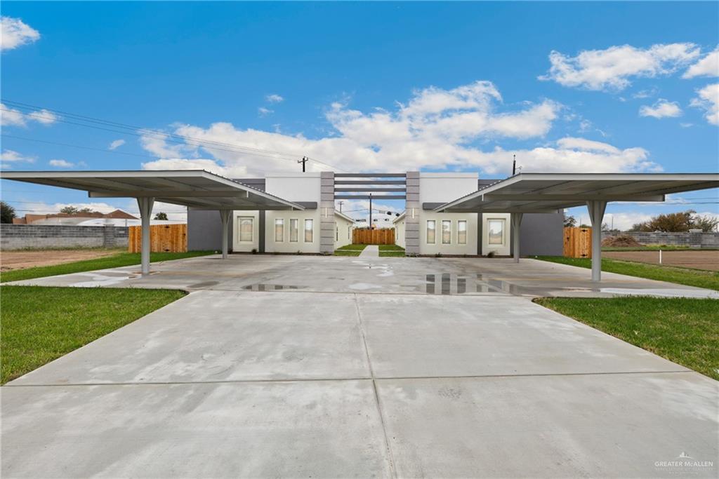 View of patio / terrace featuring a carport