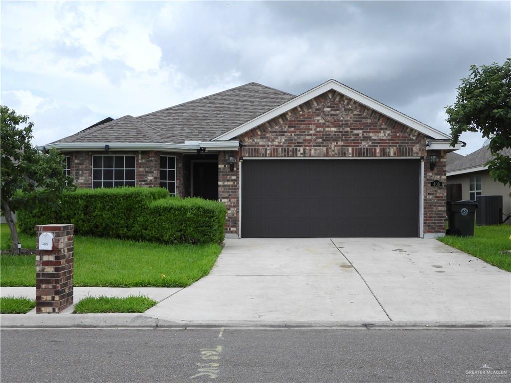 a front view of house with yard