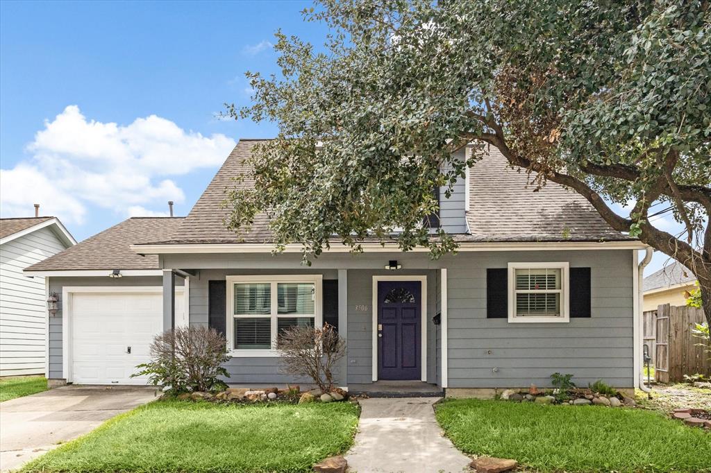 front view of house with a yard