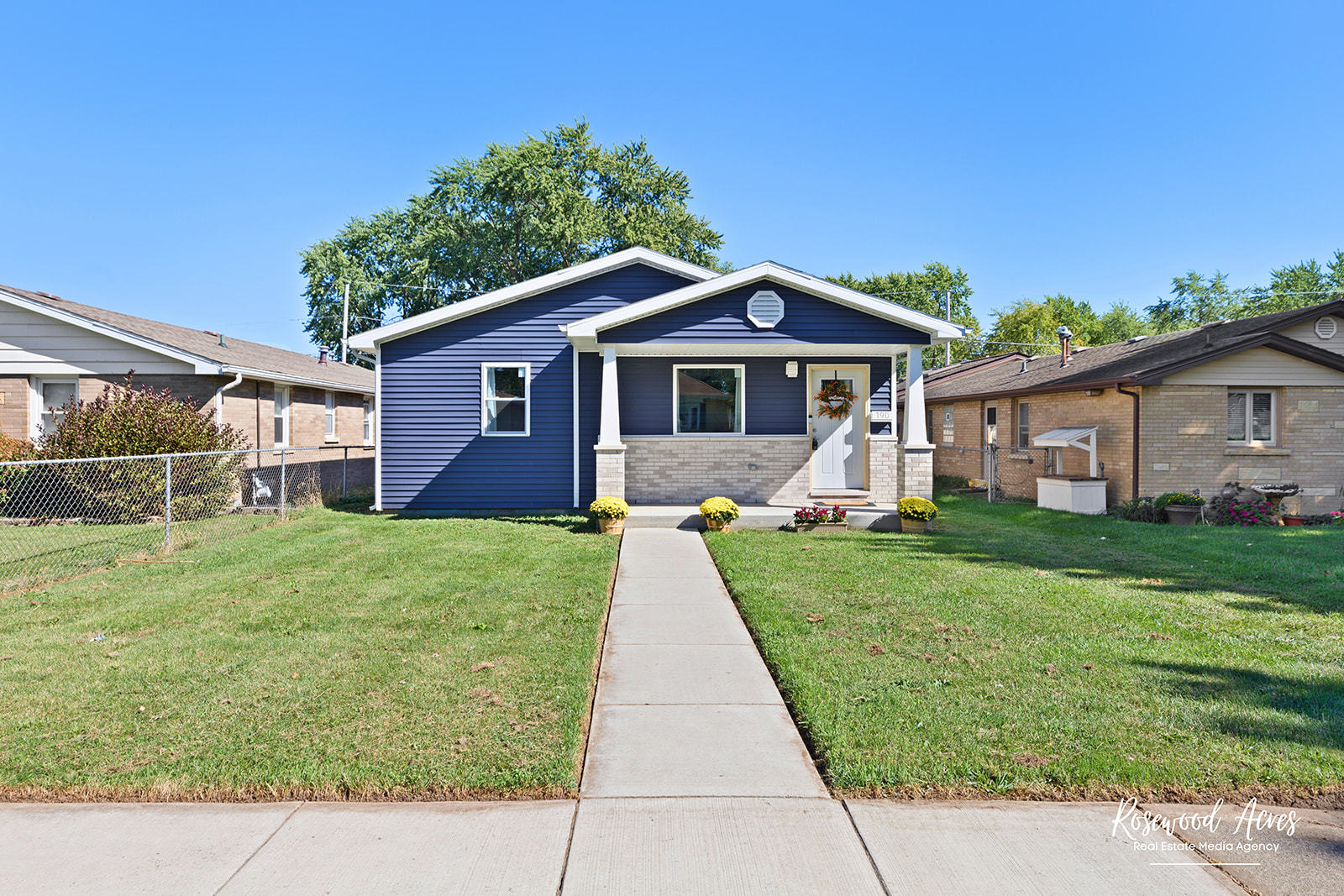 a front view of a house with yard