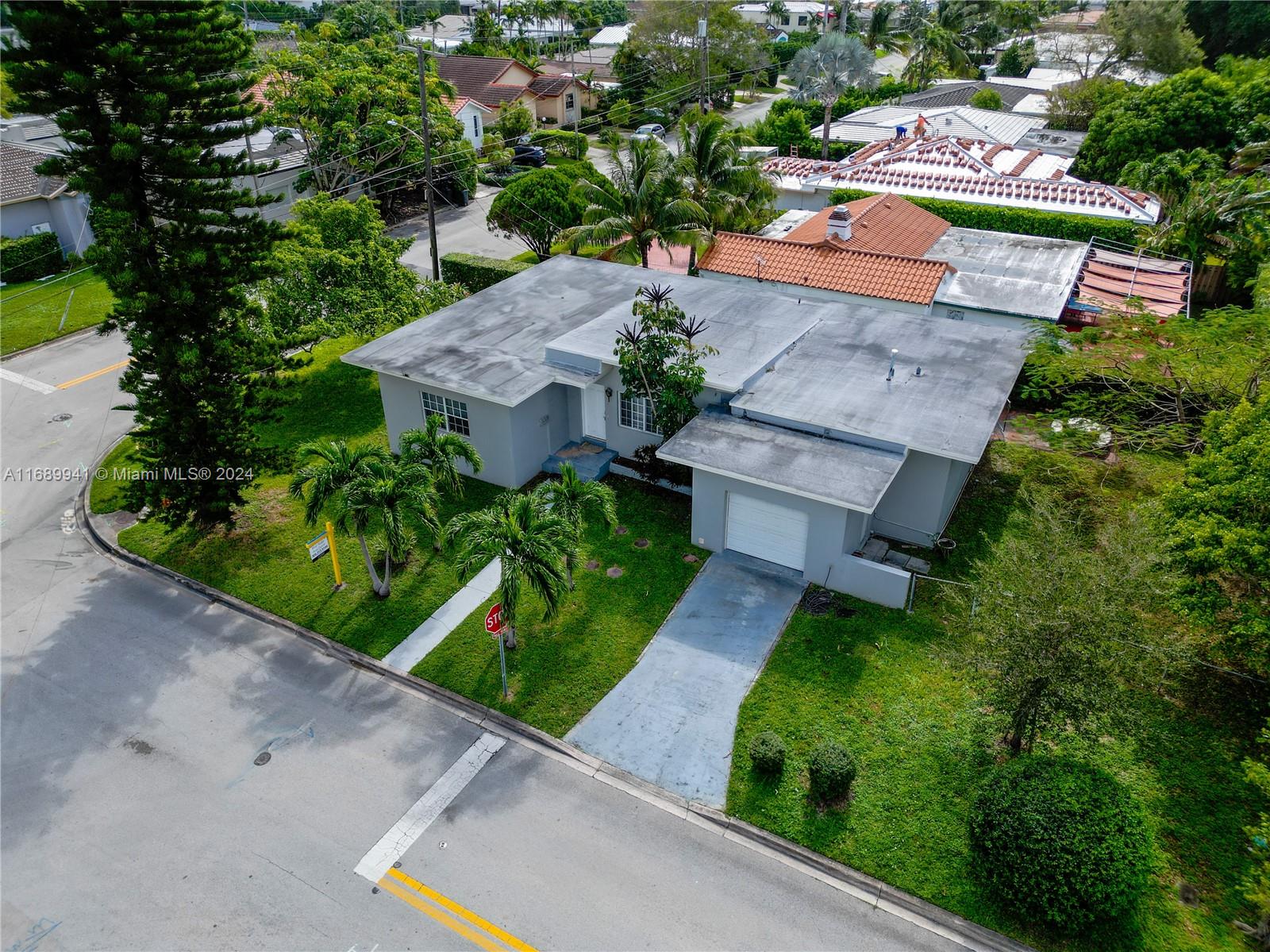 an aerial view of a house with a garden