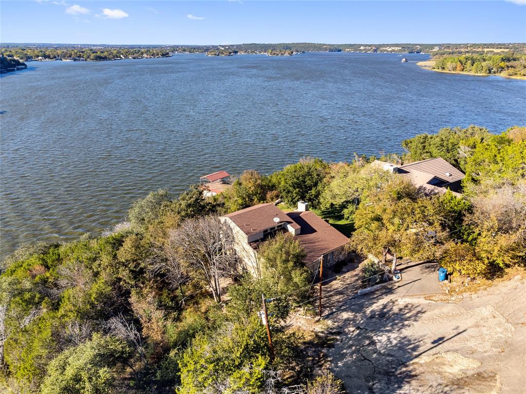 a aerial view of a house with a yard